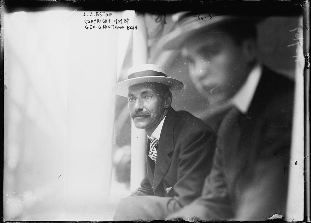 John Jacob Astor leaning from a train window, 1909